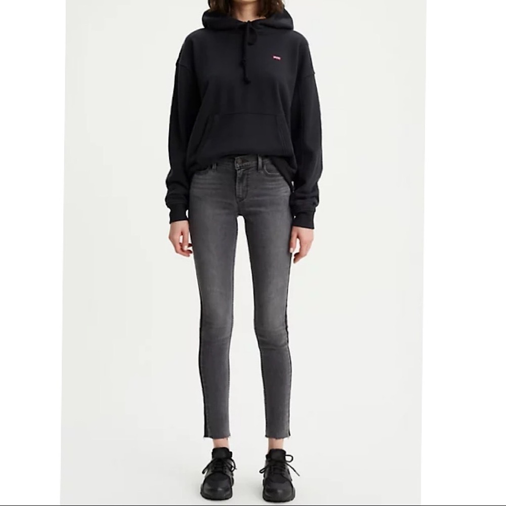 Levi’s 710 Super Skinny Raw Hem Mid Rise Jeans